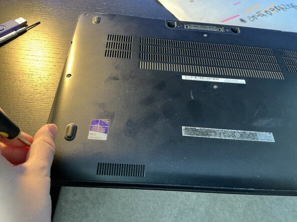 Dell Latitude E7470 Swollen Battery Replacement, Remove screws on back of device: crwdns2935265:01crwdnd2935265:02crwdnd2935265:02crwdne2935265:0