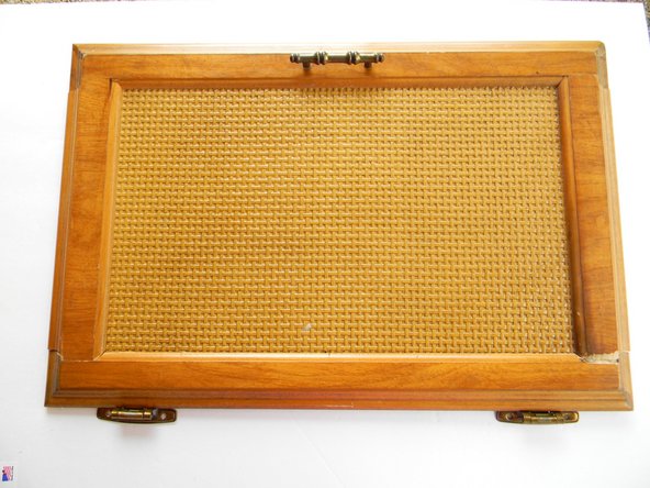 After at least 15 minutes you can pull tape off completely and wipe away any excess epoxy. It is now finished and ready to be re-installed back to the cabinet.