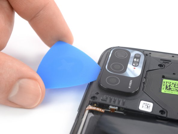 Xiaomi Redmi Note 10 5G Screen Replacement, Pry up the camera cover: crwdns2935265:09crwdnd2935265:02crwdnd2935265:02crwdne2935265:0