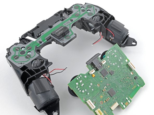 DualSense Controller v2 Vibration Motor Replacement, Desolder the vibration motor wires: crwdns2935265:026crwdnd2935265:03crwdnd2935265:03crwdne2935265:0