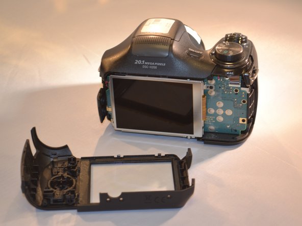 Sony Cyber-shot DSC-H200 SD Door Replacement: crwdns2935265:04crwdnd2935265:02crwdnd2935265:02crwdne2935265:0