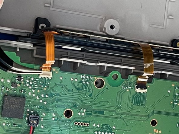 Left Nintendo Switch NES Controller Charging Rail Replacement, Pry the ZIF connectors up: crwdns2935265:03crwdnd2935265:02crwdnd2935265:03crwdne2935265:0
