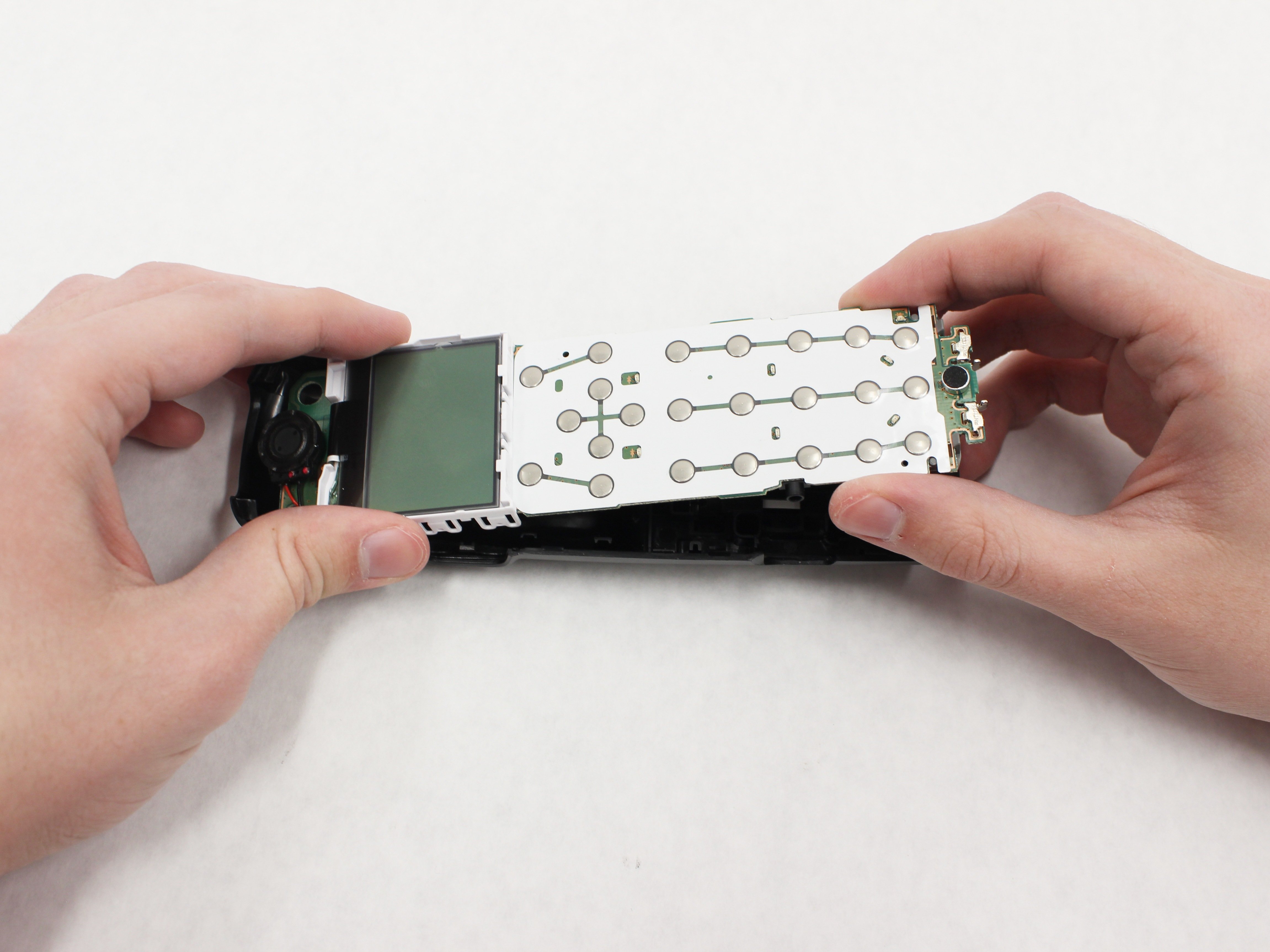 Panasonic KX-TGE233 Earpiece Speaker Replacement - iFixit