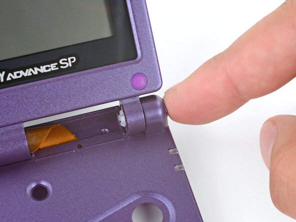 How to Reshell Your Game Boy Advance SP, Install the hinges: crwdns2935265:046crwdnd2935265:02crwdnd2935265:03crwdne2935265:0