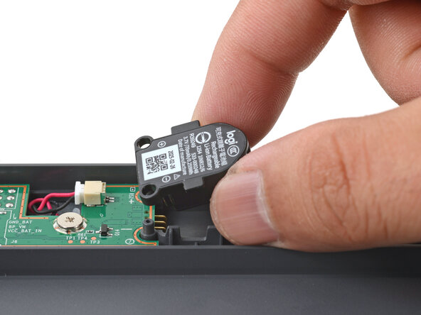 Logitech Signature Slim Solar+ Battery Replacement, Install the replacement battery: crwdns2935265:07crwdnd2935265:01crwdnd2935265:03crwdne2935265:0