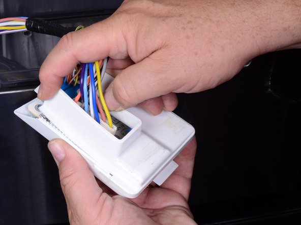 LG Refrigerator LFX25973 Dispenser PC Board Replacement, Release the circuit board holder cover: crwdns2935265:013crwdnd2935265:02crwdnd2935265:03crwdne2935265:0