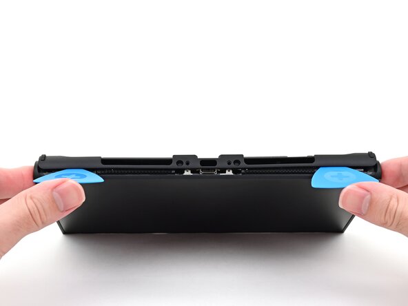 Nintendo Switch 2 Microphone Replacement, Remove the back cover: crwdns2935265:017crwdnd2935265:02crwdnd2935265:03crwdne2935265:0