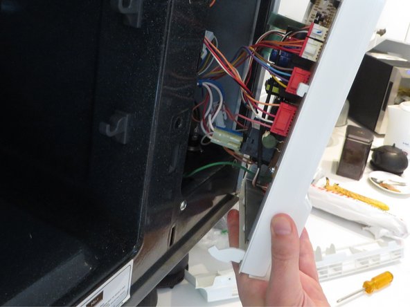 GE Profile Microwave Oven Touchpad Repair, Carefully lift and pull a little: crwdns2935265:05crwdnd2935265:02crwdnd2935265:02crwdne2935265:0