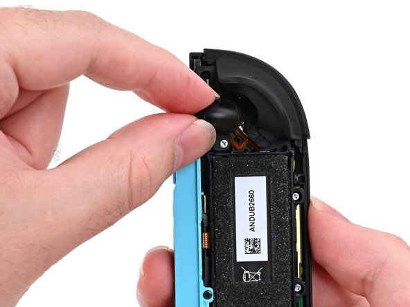 Joy-Con 2 (Left) Joystick Replacement, Remove the release button: crwdns2935265:012crwdnd2935265:01crwdnd2935265:02crwdne2935265:0