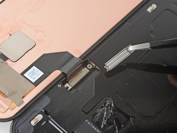 Google Pixel 9a Screen Replacement, Remove the cable cover: crwdns2935265:017crwdnd2935265:03crwdnd2935265:03crwdne2935265:0