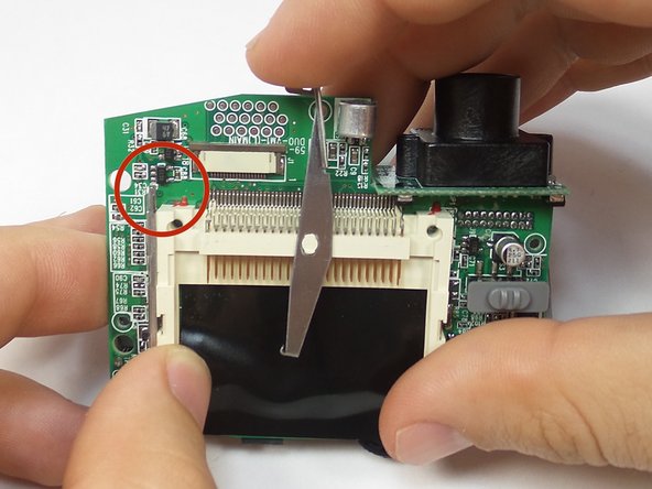 Aiptek Pocket DVII 1.3M LCD  Memory Ejecting Assembly Replacement: step 14, image 1 of 2
