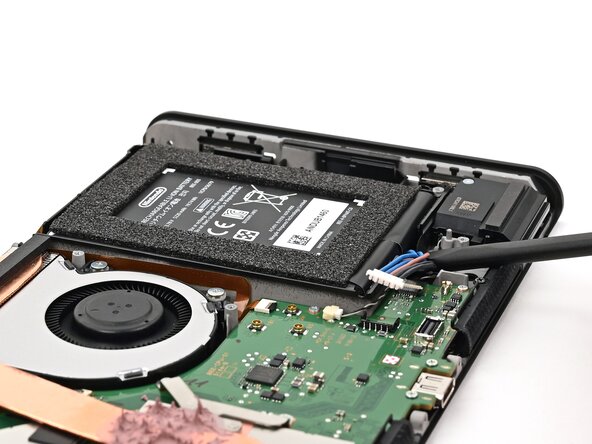 Nintendo Switch 2 Battery Replacement, Lift the battery: crwdns2935265:035crwdnd2935265:02crwdnd2935265:03crwdne2935265:0