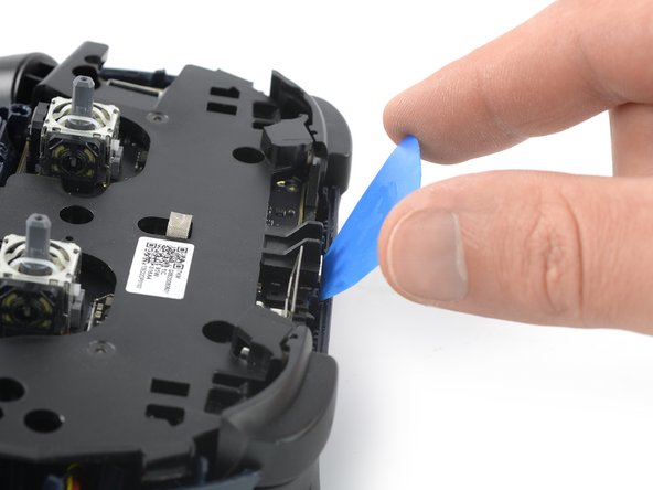 Google Stadia Controller Battery Replacement, Insert an opening pick: step 21, image 2 of 2