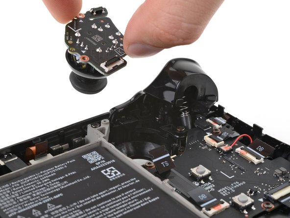 Steam Deck OLED Left Thumbstick Replacement, Remove the left thumbstick: crwdns2935265:013crwdnd2935265:03crwdnd2935265:03crwdne2935265:0