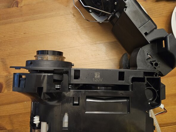 Nespresso Vertuo Next Pod holder , barcode reader and drain pipe Replacement, Remove the top rear cover: step 5, image 2 of 2