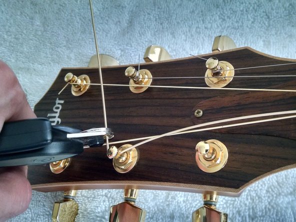 How to clean and maintain your Taylor 816CE, Install last three new strings: crwdns2935265:06crwdnd2935265:02crwdnd2935265:03crwdne2935265:0