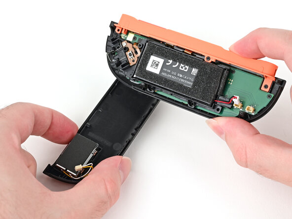 Joy-Con 2 (Right) Joystick Replacement, Prop up the controller: crwdns2935265:017crwdnd2935265:02crwdnd2935265:03crwdne2935265:0