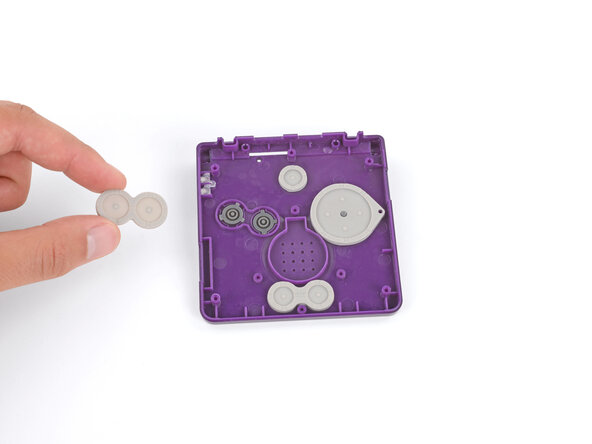 How to Reshell Your Game Boy Advance SP, Remove the buttons: crwdns2935265:042crwdnd2935265:01crwdnd2935265:03crwdne2935265:0