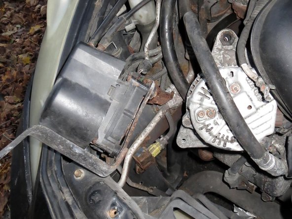 Toyota Celica GT / GTS Alternator Troubleshooting and Replacement, Removing the alternator cont.: crwdns2935265:06crwdnd2935265:02crwdnd2935265:03crwdne2935265:0