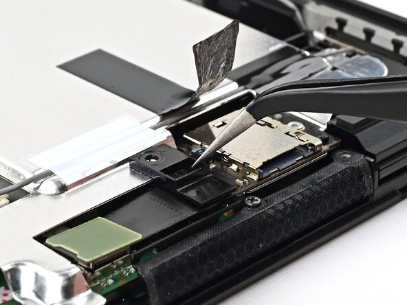 Nintendo Switch 2 MicroSD Card Reader Replacement, Install the cable bracket: crwdns2935265:029crwdnd2935265:02crwdnd2935265:02crwdne2935265:0