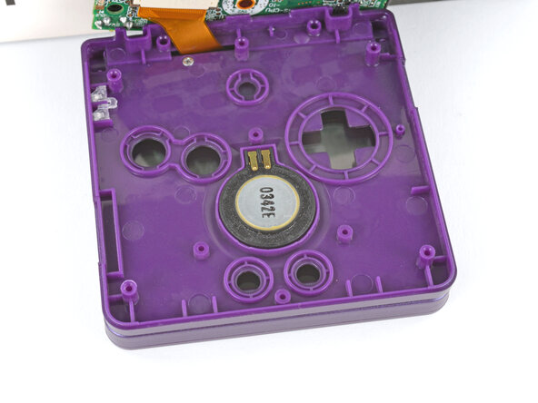 How to Reshell Your Game Boy Advance SP, Install the speaker: crwdns2935265:056crwdnd2935265:03crwdnd2935265:03crwdne2935265:0