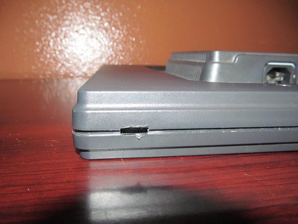 Acer AL2216W Capacitor Replacement, Unlatch the clips (Bottom): crwdns2935265:05crwdnd2935265:02crwdnd2935265:02crwdne2935265:0