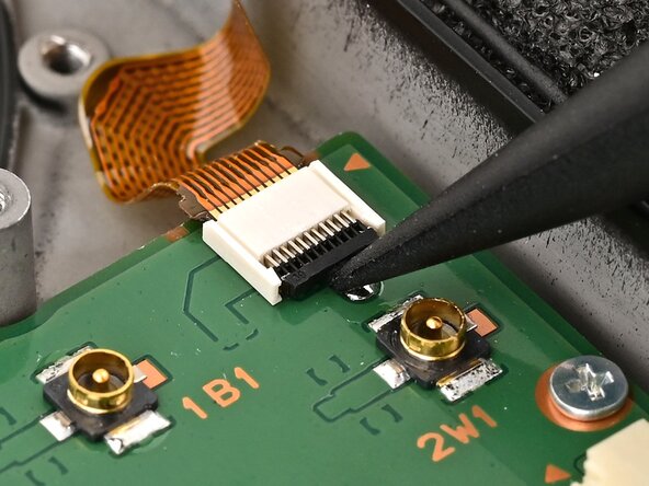 Nintendo Switch 2 Board Replacement, Disconnect the button board: crwdns2935265:053crwdnd2935265:01crwdnd2935265:02crwdne2935265:0