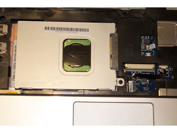 Dell Inspiron Mini 1012 Hard Drive Replacement, Remove Hard drive: crwdns2935265:04crwdnd2935265:03crwdnd2935265:03crwdne2935265:0