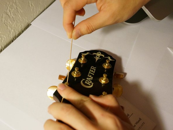 How to restring an Acoustic Guitar: crwdns2935265:04crwdnd2935265:02crwdnd2935265:03crwdne2935265:0