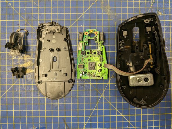 Logitech M500 Mouse Switch Replacement, Remove the circuit board: crwdns2935265:09crwdnd2935265:03crwdnd2935265:03crwdne2935265:0