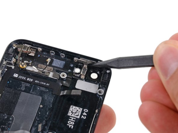 Замена задней части корпуса iPhone 5, Кнопка питания: crwdns2935265:039crwdnd2935265:02crwdnd2935265:02crwdne2935265:0