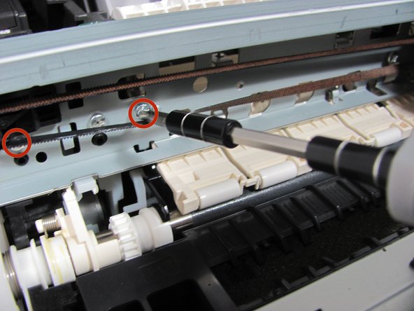 Canon PIXMA MP620B Ink Head Replacement, Remove the three screws holding the top rear slider rail: crwdns2935265:09crwdnd2935265:02crwdnd2935265:02crwdne2935265:0