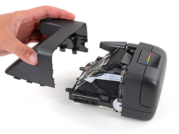 Polaroid Flip Top Shell Replacement, Remove the top shell: crwdns2935265:010crwdnd2935265:02crwdnd2935265:02crwdne2935265:0