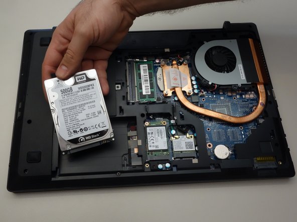 why! W650SZ Remplacement de la carte mère, Retirer le disque dur HDD: crwdns2935265:04crwdnd2935265:02crwdnd2935265:02crwdne2935265:0