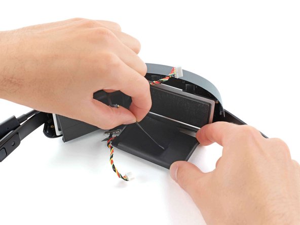 HTC Vive XR Elite Headstraps Replacement, Remove the right battery cell: crwdns2935265:027crwdnd2935265:02crwdnd2935265:03crwdne2935265:0