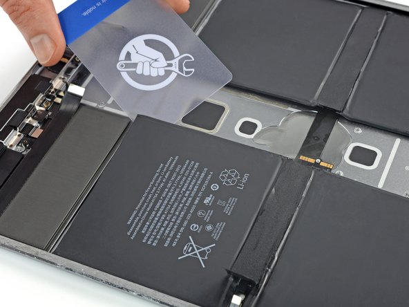 iPad Pro 12.9" 2nd Gen Battery Replacement, Loosen the top left battery cell: crwdns2935265:072crwdnd2935265:02crwdnd2935265:03crwdne2935265:0