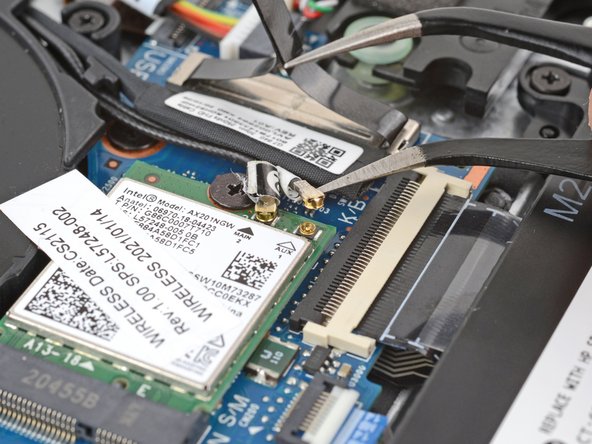 HP EliteBook 840 G7 Wi-Fi Module Replacement, Disconnect the WLAN module cables: crwdns2935265:08crwdnd2935265:02crwdnd2935265:03crwdne2935265:0