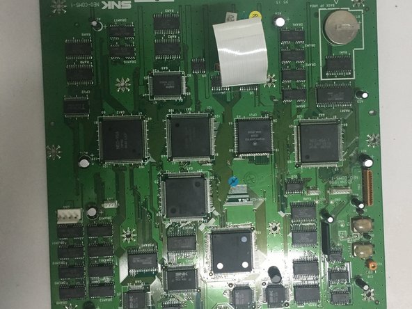 SNK Neo Geo CD Teardown, step 13: crwdns2935265:013crwdnd2935265:03crwdnd2935265:03crwdne2935265:0