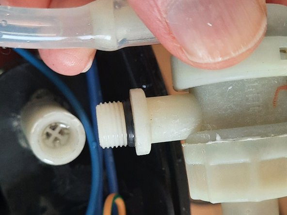 Delonghi EC220.CD coffee machine Pump Replacement, Remove the plastic 3-way (OPV) valve: crwdns2935265:07crwdnd2935265:03crwdnd2935265:03crwdne2935265:0