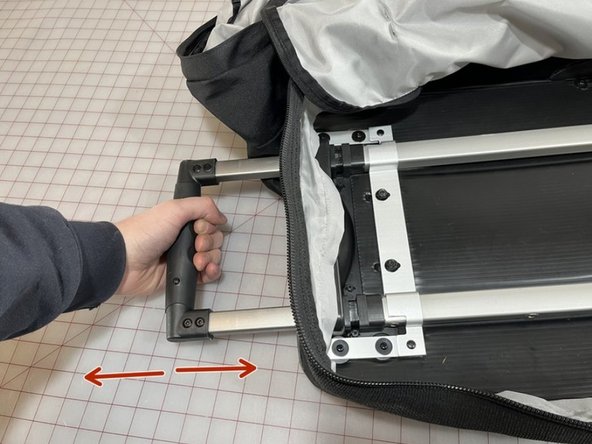 Handle Replacement on Patagonia Freewheeler/Freightliner Luggage, Insert the new handle: crwdns2935265:04crwdnd2935265:02crwdnd2935265:03crwdne2935265:0