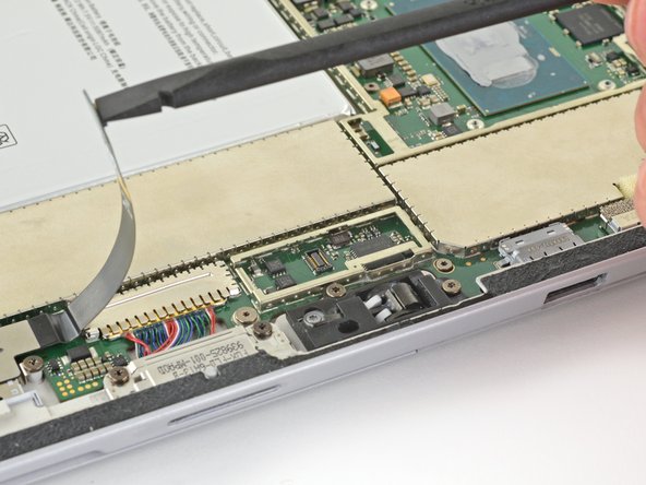 Microsoft Surface Pro 4 Motherboard Replacement, Disconnect the microSD card reader: crwdns2935265:040crwdnd2935265:03crwdnd2935265:03crwdne2935265:0