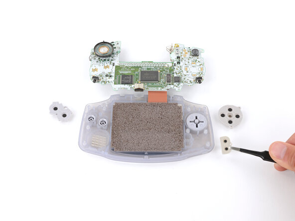 Game Boy Advance LCD Screen Replacement, Remove the silicone pads: crwdns2935265:011crwdnd2935265:03crwdnd2935265:03crwdne2935265:0