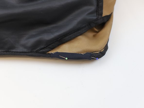 How to Repair a Loose Webbing Strap in a Backpack, Pin the "binding" strap: crwdns2935265:010crwdnd2935265:03crwdnd2935265:03crwdne2935265:0