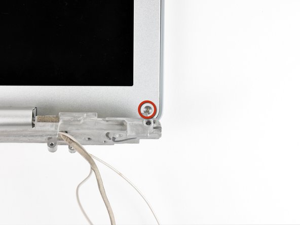 PowerBook G4 Aluminum 12" 1-1.5 GHz Display Data Cable Replacement, Rear Display Bezel: crwdns2935265:063crwdnd2935265:02crwdnd2935265:02crwdne2935265:0