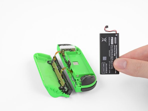 Right Joy-Con Joystick Replacement, Remove the battery: crwdns2935265:05crwdnd2935265:03crwdnd2935265:03crwdne2935265:0