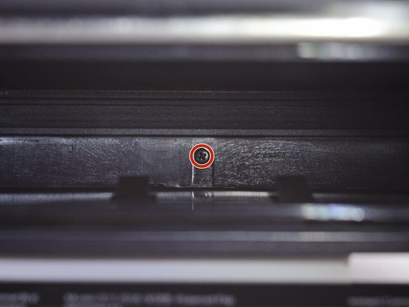 Polaroid Flip Bottom Shell Replacement, Remove the bottom shell screw: crwdns2935265:03crwdnd2935265:02crwdnd2935265:03crwdne2935265:0