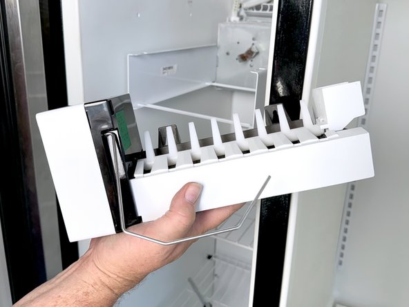 Frigidaire Side-By-Side Refrigerator Evaporator Fan Cover Removal, Remove the ice maker: crwdns2935265:06crwdnd2935265:02crwdnd2935265:02crwdne2935265:0