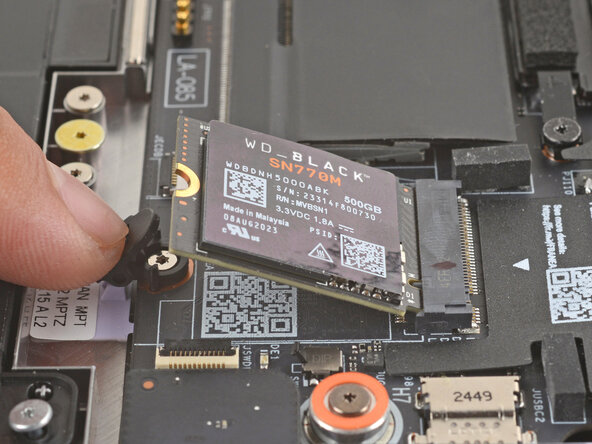Framework Laptop 12 SSD Clip Replacement, Unlatch the SSD: 7 단계, 이미지 2개 중 2개