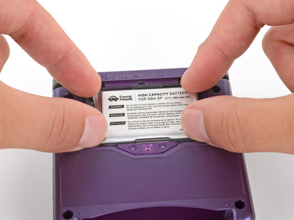 How to Reshell Your Game Boy Advance SP, Install the battery: crwdns2935265:066crwdnd2935265:03crwdnd2935265:03crwdne2935265:0