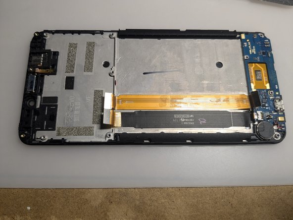 Wiko View Screen Replacement, Unplug the motherboard's link cable: crwdns2935265:011crwdnd2935265:02crwdnd2935265:02crwdne2935265:0